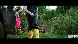 Submissive painslut softened up for painal punishment with some dunks in the pond - Lydia African and Charlotte Sartre in a real outdoor BDSM sex documentary filmed in Wisconsin